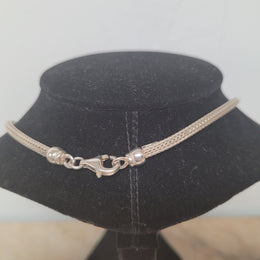 Beautiful Italian sterling silver woven double heart necklace. In good condition.