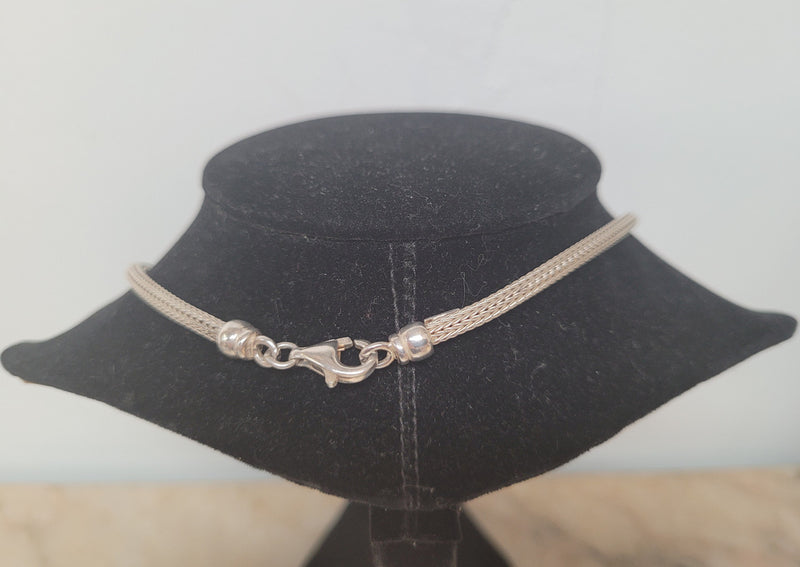 Beautiful Italian sterling silver woven double heart necklace. In good condition.