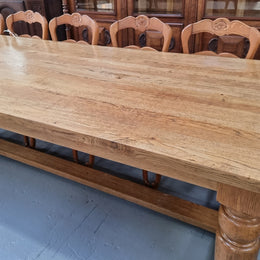 Stunning three meter Bespoke English Oak stretcher base farmhouse dining table. Can easily sit 10-12 people and is in very good original detailed condition.