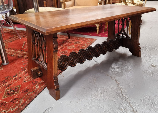 Sourced from France is this beautiful French Oak Gothic style coffee table with lovely carved details. It is in good original detailed condition.