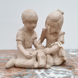 Vintage Austin productions signed Patricia Hannon Sculpture, "Boy Girl and Dog" "1981GG183". In good condition please view photos as they help form part of the description.