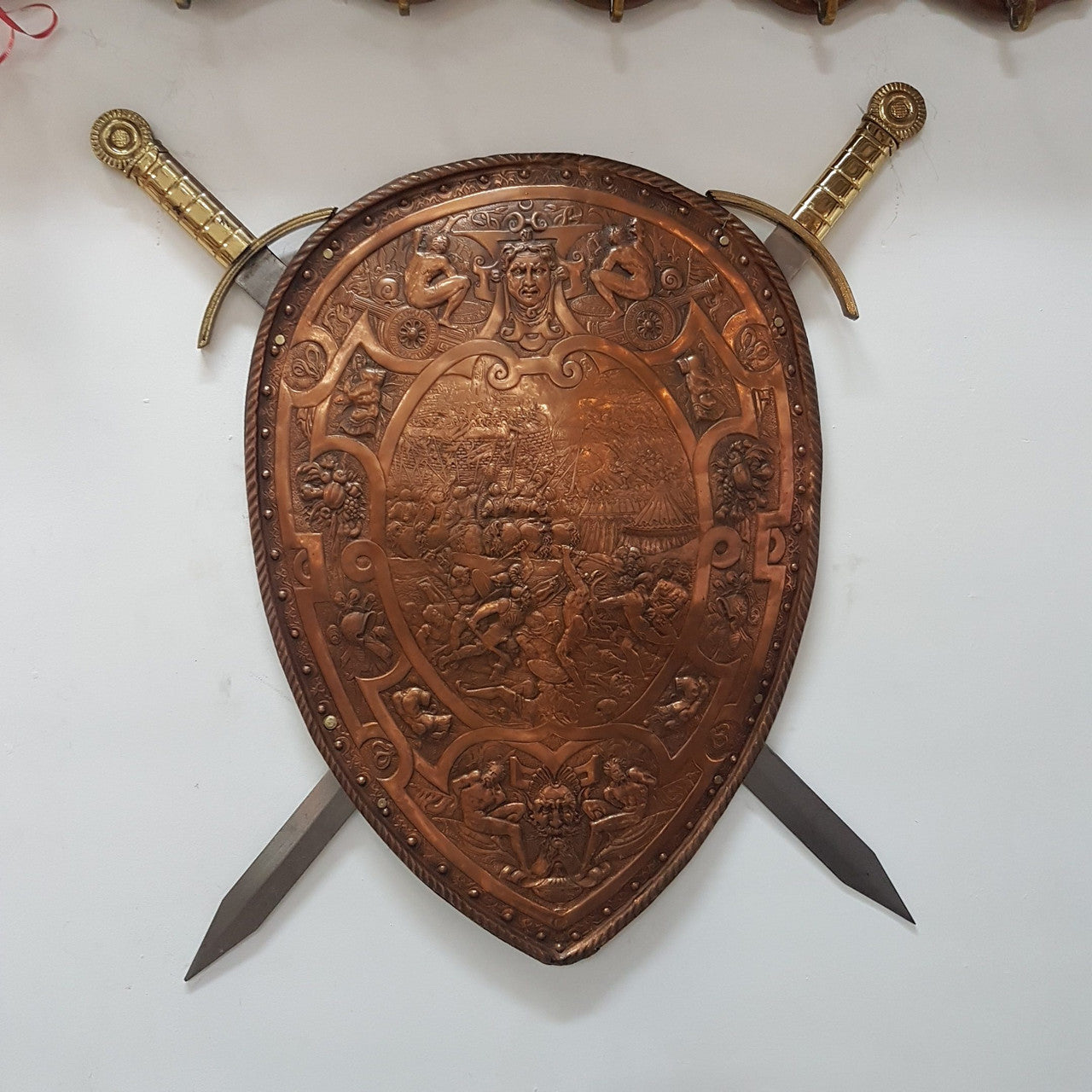 Antique Embossed Copper Shield