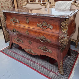 French Louis XVI style three drawer commode with amazing coloured marble. It has decorative brass mounts and is in very good original detailed condition.