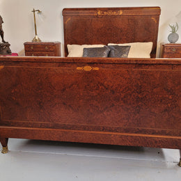 French Art Deco bedroom suite consisting of queen size bed in Amboyna wood and featuring pretty inlay. It comes with a matching pair of bedsides. It is a very stylish and high quality suite. It has been sourced from France and is in good original detailed condition.