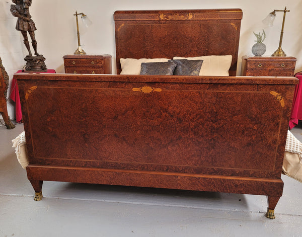 French Art Deco bedroom suite consisting of queen size bed in Amboyna wood and featuring pretty inlay. It comes with a matching pair of bedsides. It is a very stylish and high quality suite. It has been sourced from France and is in good original detailed condition.