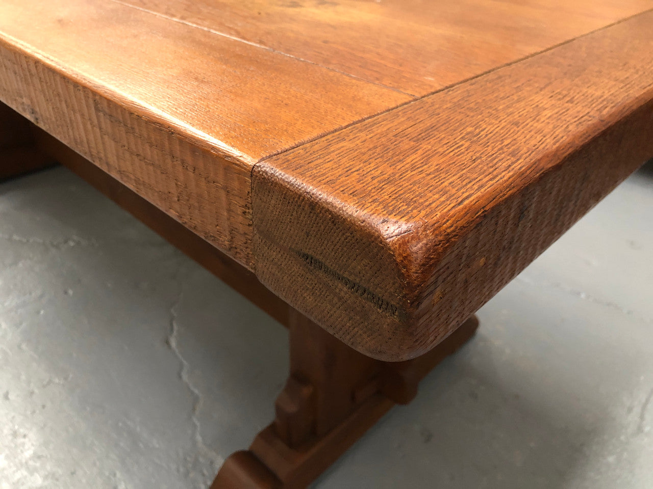 Lovely Oak French Farmhouse table with a thick plank top and lovely stretcher base. Can comfortable seat 8-10 people and is in good original detailed condition.