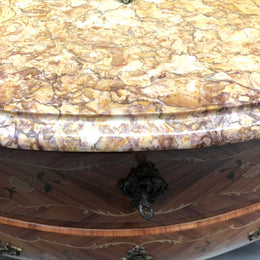 A stunning French 19th century Louis XV style commode with kingwood marquetry inlay. Has beautiful ormolu mounts and marble top.