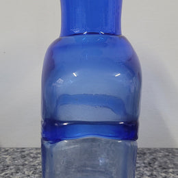 "Bertil Vallien" Kosta Boda blue vase. Bertil Vallien is an internationally celebrated glass artist and designer in Sweden who has received numerous awards. The vase is in good condition with no chips or cracks, please view photos as they help form part of the description.