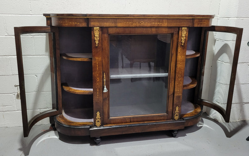 Victorian Rosewood inlaid side cabinet/credenza with velvet lined shelves and gilt mounts. It has been sourced locally and is in good original condition with loads of character.