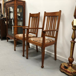 Pair Of Upholstered Arts And Crafts Carver Chairs