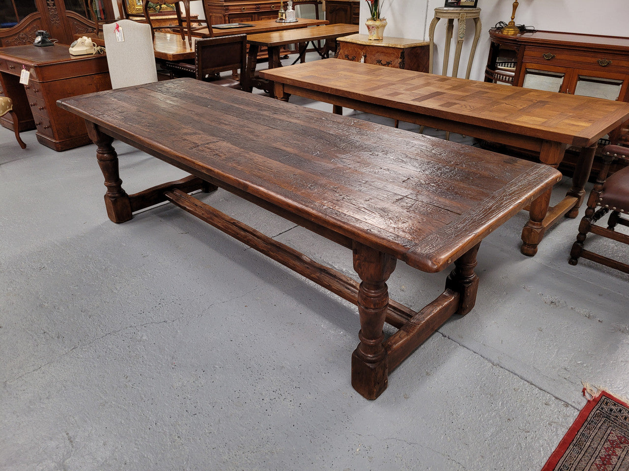 Amazing 2.65 meter French Elm Refectory dining table with loads of rustic charm. This table has been sourced from France and can comfortably seat ten people. It is in good original detailed condition.