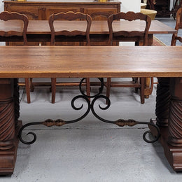 Amazing French Oak Spanish Renaissance style dining table with beautiful decorative iron work. It has been sourced from France and can comfortable seat 8- 10 people. Sourced from France and is good original detailed condition.