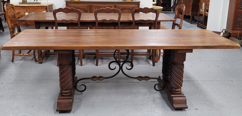 Amazing French Oak Spanish Renaissance style dining table with beautiful decorative iron work. It has been sourced from France and can comfortable seat 8- 10 people. Sourced from France and is good original detailed condition.