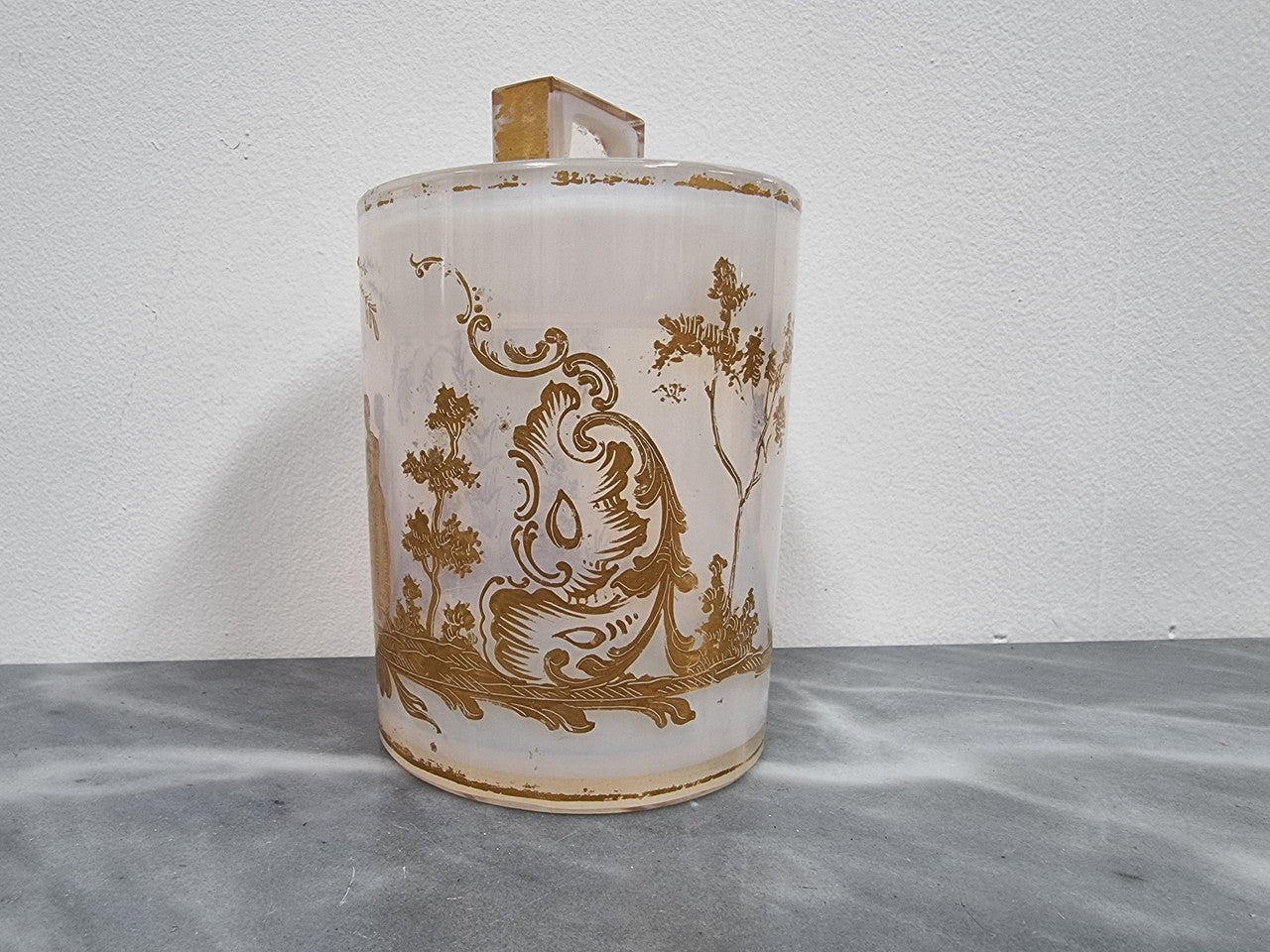 Antique French opaline glass lidded container with lovely gilt decoration. In good original condition with no chips or crack, please view photos as they help form part of the description.