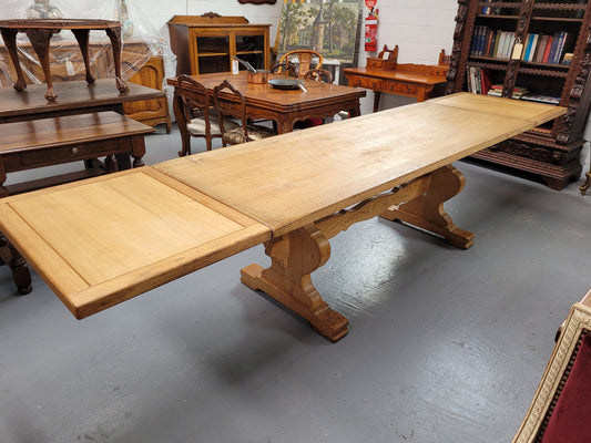 Stunning French Oak Farmhouse table with two extension leaves. When fully extended the table measures to a massive 339.5 cm long. Sourced from France and in good original detailed condition.