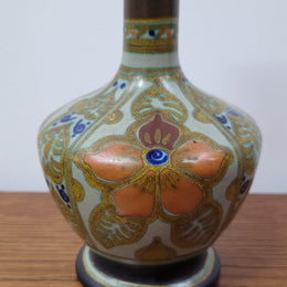 Elegant shaped Vintage Gouda vase hand decorated in the “Hilaire” pattern. Well marked on the Base. Light crazing on rim. Please see photos as they help form part of the description.