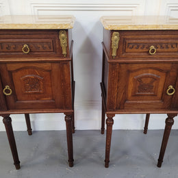 French Oak pair of Louis 16th style marble top bedsides with stunning bronze mounts. They have been sourced from France and are in good original detailed condition.