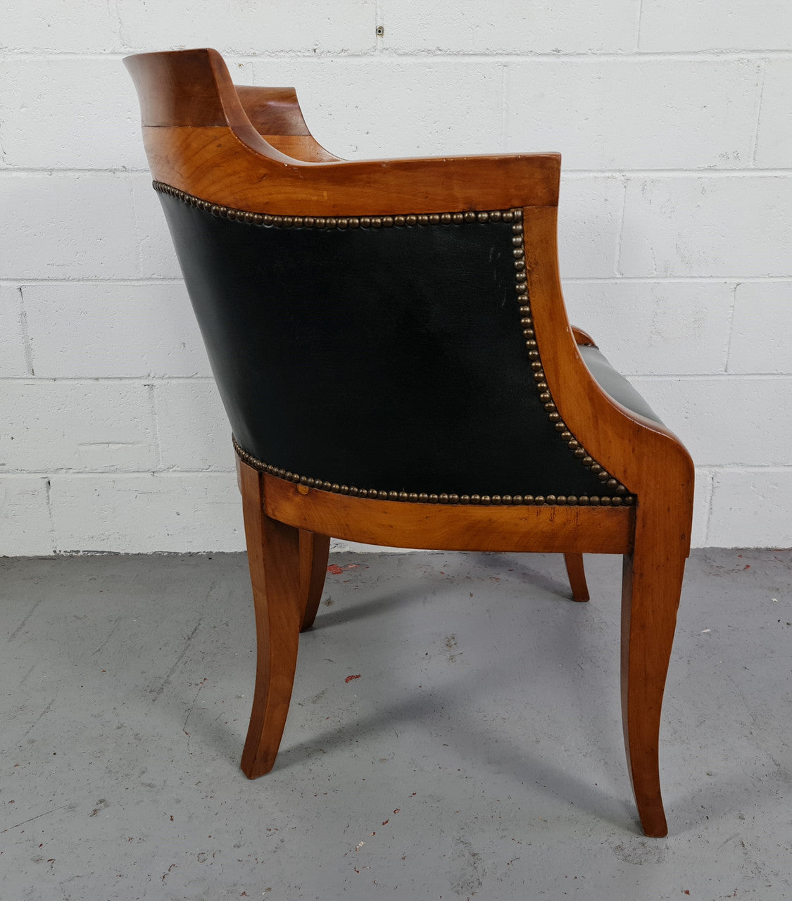 Antique Empire style Walnut and leather office desk chair. In good original detailed condition and leather is in good used condition.