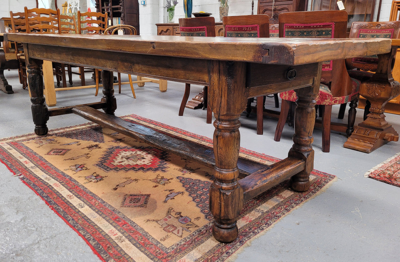 Large impressive 19th century 2.5 meter Antique French Oak farmhouse table. Loads of character with a stunning solid thick top and has a long drawer at one end. Sourced from France and in good original detailed condition.