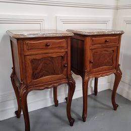 French Louis XVI style figured Walnut marble top bedsides. In good original detailed condition.