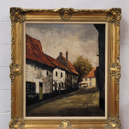 Dutch signed oil on canvas depicting village street in a beautiful gilt frame. It is in good original detailed condition and has been sourced from France.