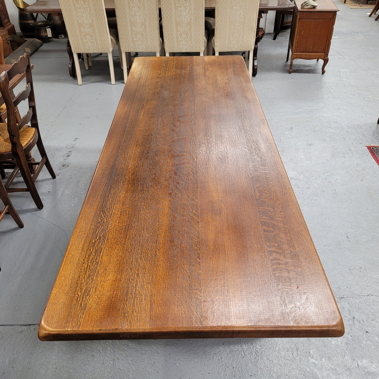 Amazing French Oak Spanish Renaissance style dining table with beautiful decorative iron work. It has been sourced from France and can comfortable seat 8- 10 people. Sourced from France and is good original detailed condition.
