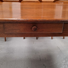 Antique French Oak Farmhouse table in fully restored condition. Features a single drawer and tapered legs.