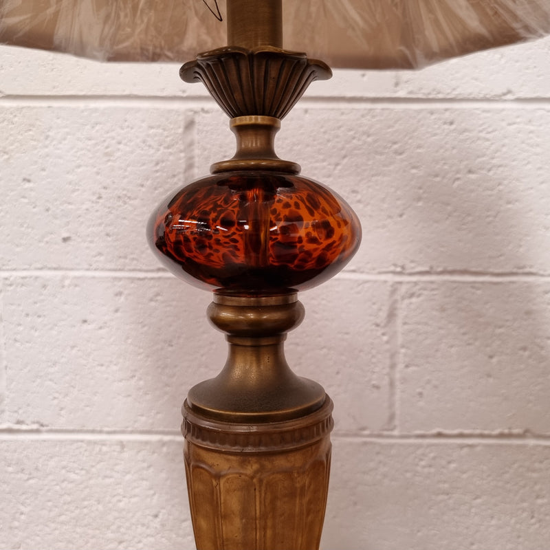 Beautiful pair of metal and glass lamp bases with new gold shades. They are in good original working condition and have been sourced locally.