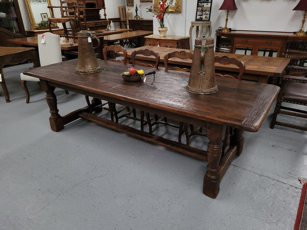 Amazing 2.65 meter French Elm Refectory dining table with loads of rustic charm. This table has been sourced from France and can comfortably seat ten people. It is in good original detailed condition.