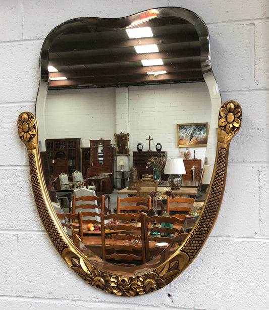 Beautiful French decorative Art Deco giltwood wall mirror with lovely floral detail. Contains its original mirror and is in good original condition.