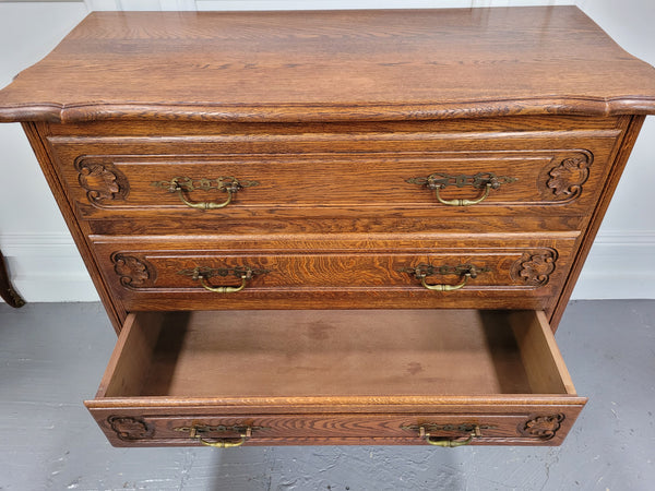 French Louis XV style Oak three drawer chest with wooden top. It has been sourced from France and is in good original detailed condition.