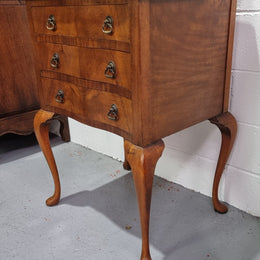 Antique Queen Anne style figured Walnut Bedside cabinet with 3 drawers. It is in good original detailed condition.