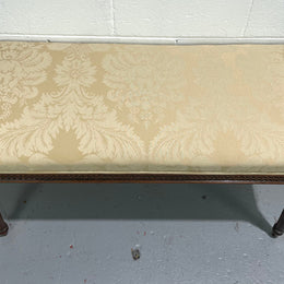 Nicely carved French Louis XVI style Walnut upholstered stool. The stool is in good condition and the frabic is in good used condition, please view photos as they help form part of the description.