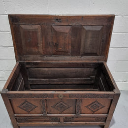 Early 19th Century French Oak carved coffer with a lift up lid for storage. A beautiful piece and in good original condition.