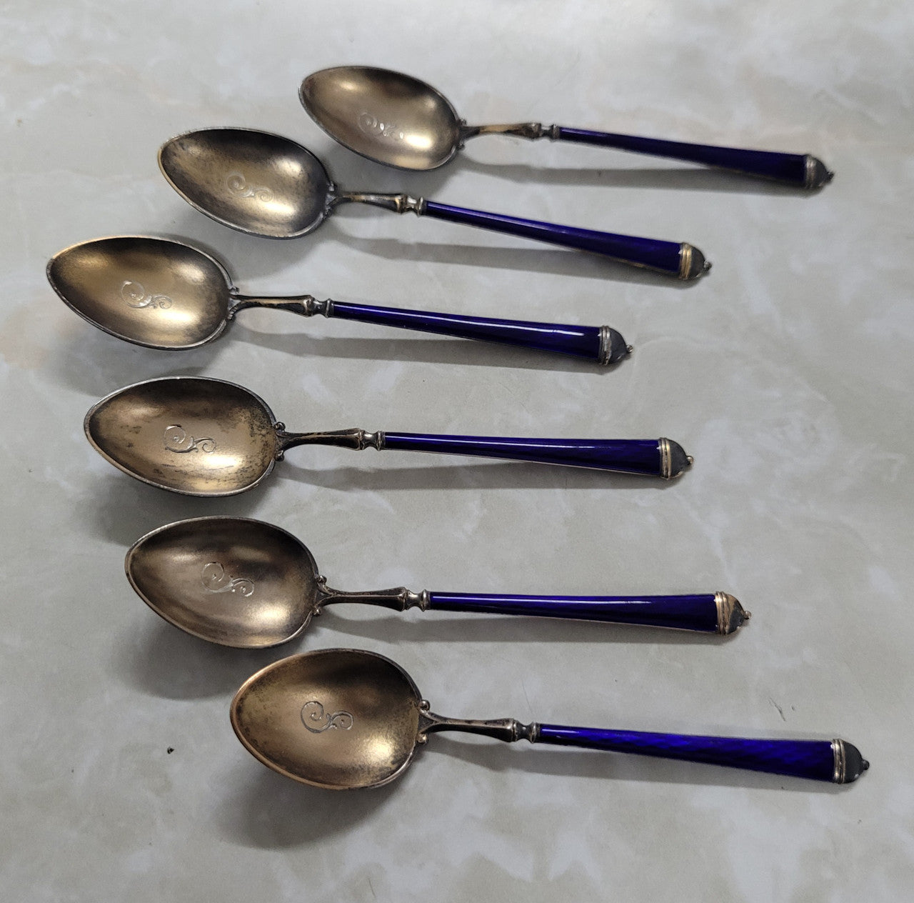 Stunning set of six 925 sterling silver and enamel spoons . In good original condition, please view photos as they help form part of the description.