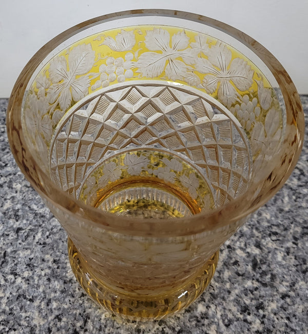 Antique Amber Bohemian acid etched and wheel engraved crystal vase. It has a stunning frieze of vine branches and a star cut base. It is in good original condition, please view photos as they help form part of the description.