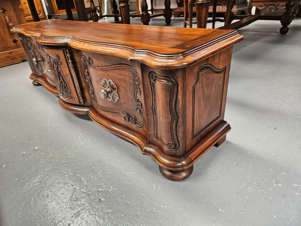 Appealing French Louis XVth style walnut converted TV unit.  Central carved  door & 2 Sliding Cupboards. In good condition.