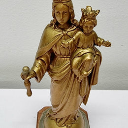 Vintage Mary gilt metal on a wooden stand, It is in good original condition and has been sourced locally. Please view photos as they help form part of the description.
