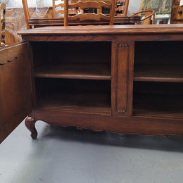 A hard to find Louis XV style French two door cabinet which would make an ideal TV cabinet. It has been sourced from France and in good original detailed condition.
