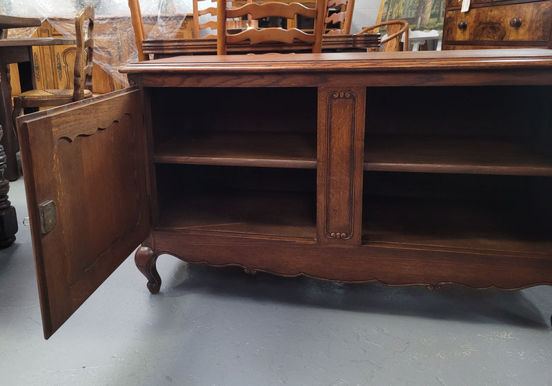 A hard to find Louis XV style French two door cabinet which would make an ideal TV cabinet. It has been sourced from France and in good original detailed condition.