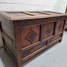 Early 19th Century French Oak carved coffer with a lift up lid for storage. A beautiful piece and in good original condition.