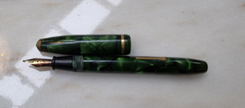 Conway Stewart  "Dinkie" 550 fountain pen green and black marble with 14k gold Nib .