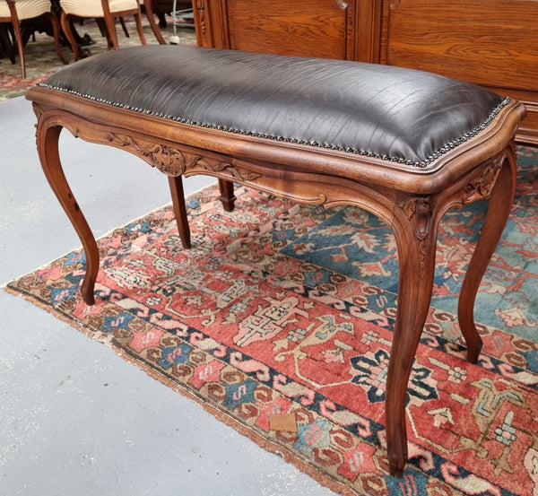 Impressive French Louis 15th style walnut upholstered duet leather stool. Very Good Condition.  Circa: 1930’s, sourced in France.