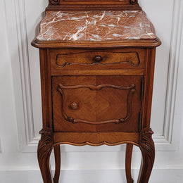 French Louis XV style Walnut single bedside cupboard with inset marble top. It has been sourced from France and is in good original detailed condition.