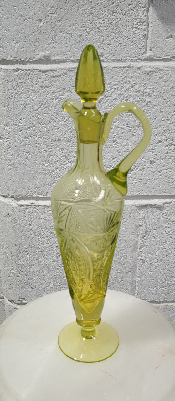 Stunning Uranium glass decanter and stopper. Great shape and height of 30.5cm