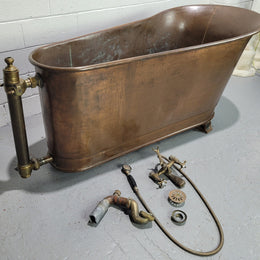 Sourced from France a rare full copper Antique bath tub on feet and includes an overflow, fittings, taps ect. In good original condition.