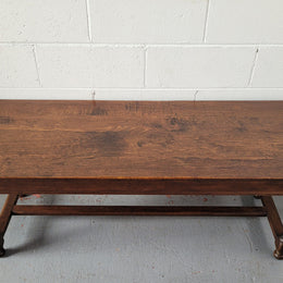 Rustic French Oak pedestal base coffee table. It is in good original detailed condition.