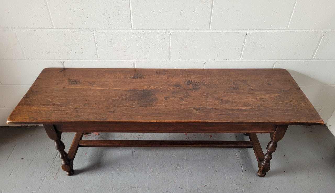 Rustic French Oak pedestal base coffee table. It is in good original detailed condition.