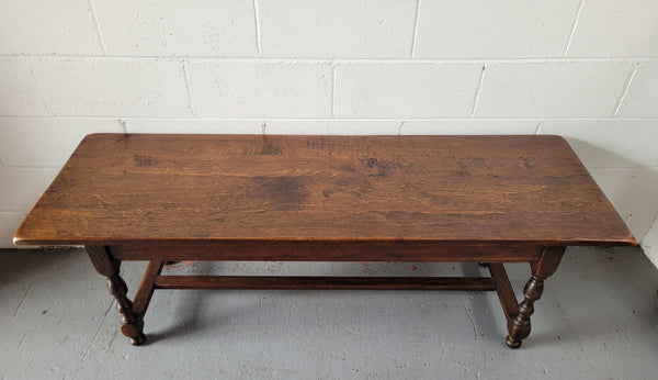 Rustic French Oak pedestal base coffee table. It is in good original detailed condition.