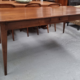 Antique French Oak Farmhouse table in fully restored condition. Features a single drawer and tapered legs.